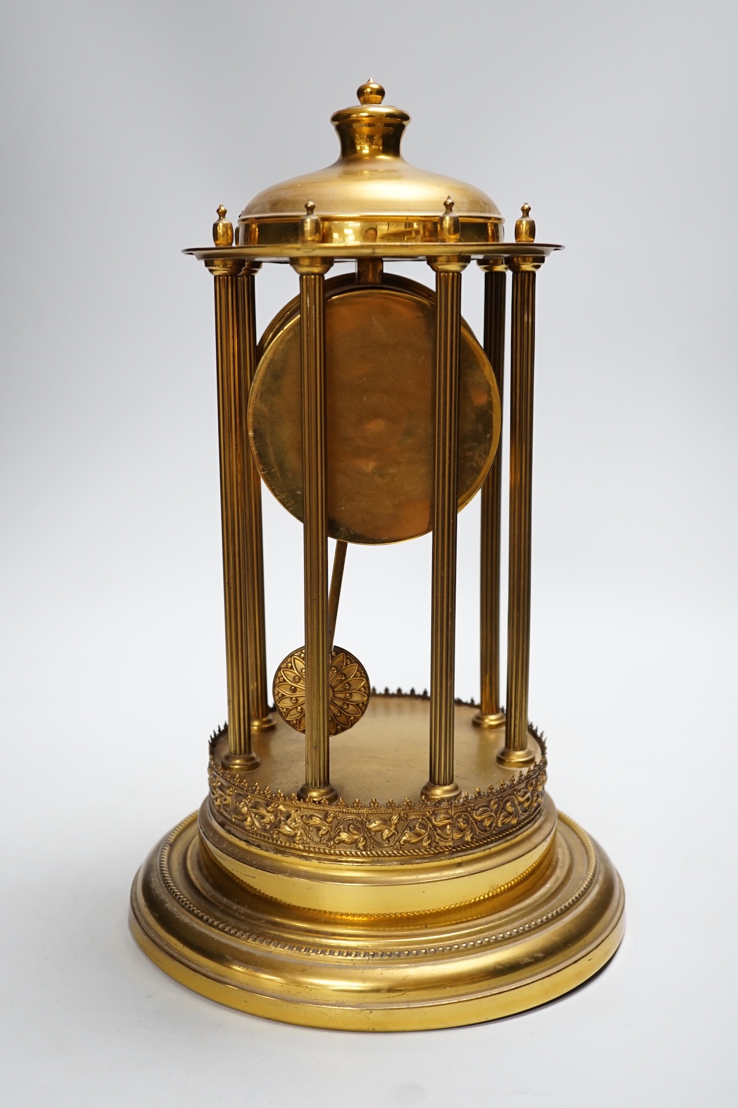 An early 20th century gilt brass pedestal mantel clock, 36cm